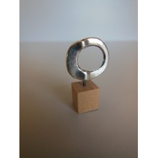 Silver Ring on Wood Base