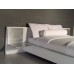 White Platform Bed with White Headboard and Aluminum Nightstands